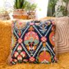 Boho-tribal-floral-embroidered-cushion-with-golden-tassels-feel-good-decor