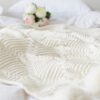 diamond-chenille-knitted-blanket-throw-with-pompoms-feel-good-decor
