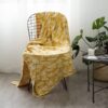 yellow-botanical-palm-leaves-knitted-cotton-blanket-throw-feel-good-decor