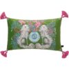 Green velvet lumbar pillow cover with white spaniel dogs, blue vase, and pink tassels.