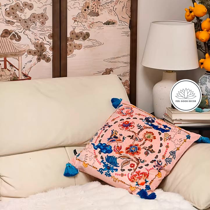 Apricot pink velvet pillow cover with oriental motifs including Qilin and blue tassels