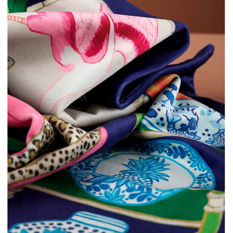 Dark blue micro velvet cushion cover featuring an orange jungle leopard on a pink sofa, green bamboo shelves, and oriental accents.