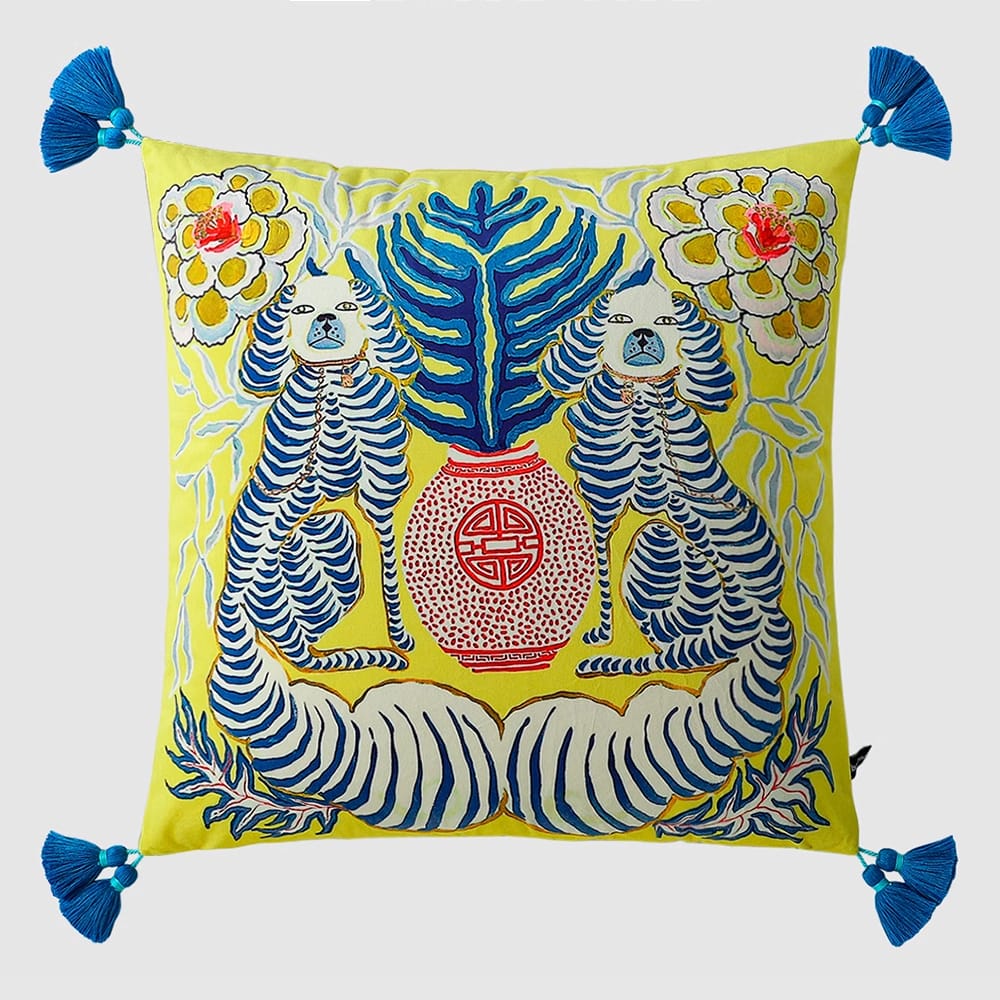 Lemon yellow velvet cushion pillow cover with Victorian spaniel dogs, red ceramic vase, and blue tassels.