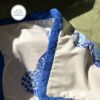 Off-white velvet lumbar pillow cushion cover with royal blue Victorian spaniel dogs and dark blue fringes
