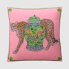 Pink micro velvet cushion cover with jungle leopard, antique porcelain jar, and green border.